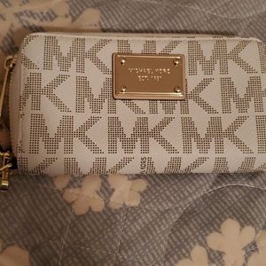 Like new white and tan Michael Kors wristlet